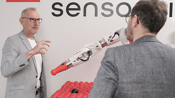 Norbert Sporer from Sensodrive in conversation with Robert Vogel from TQ